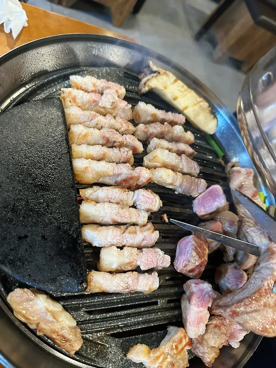 A piece of golden-browned grilled pork belly