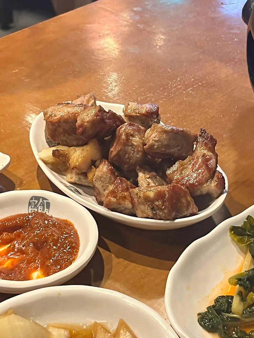 The grill and remaining meat near the end of the meal