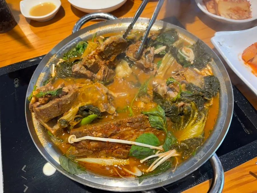 Bone stew bubbling on high heat
