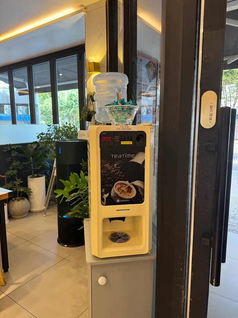 Mix coffee machine near the entrance/exit