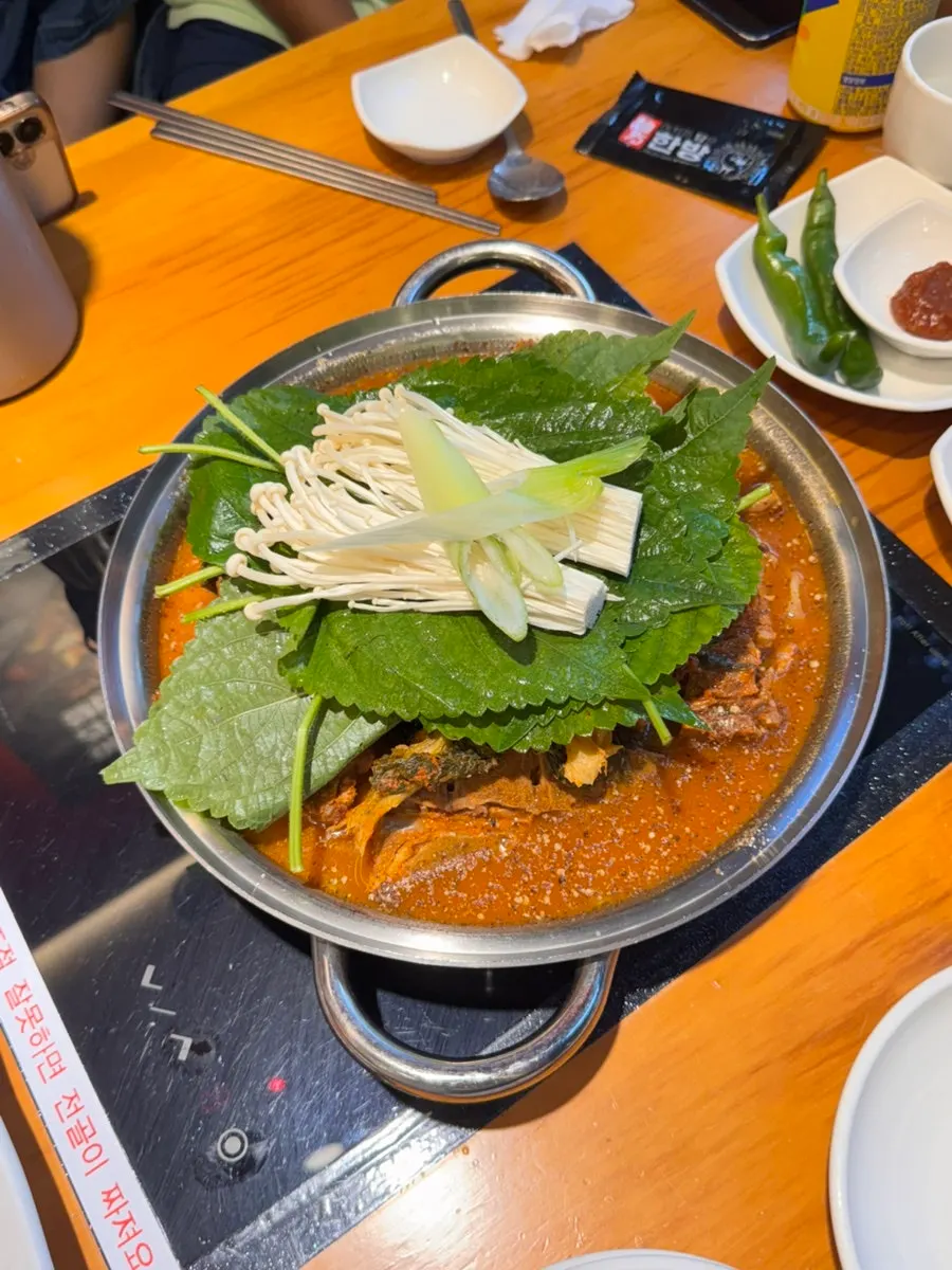 Gamjatang with dried napa cabbage and pork spine
