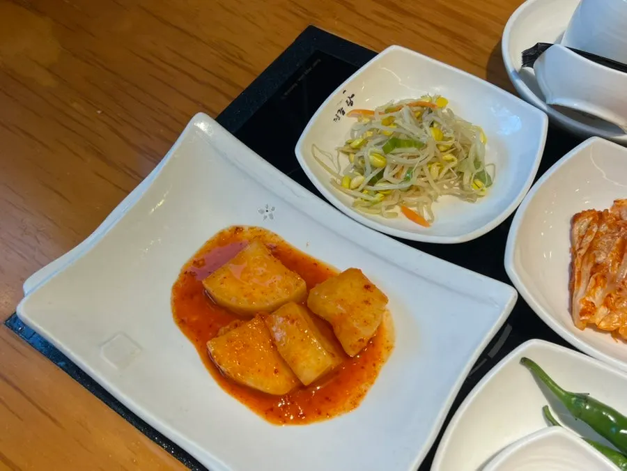 Table setting with diced radish kimchi and kimchi as basic side dishes