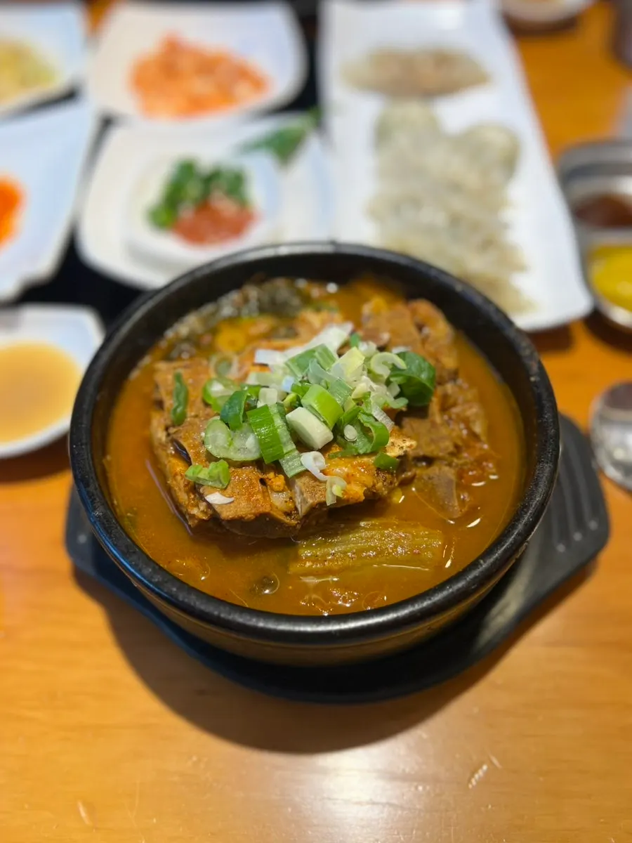 A spoonful of pork bone haejangguk broth