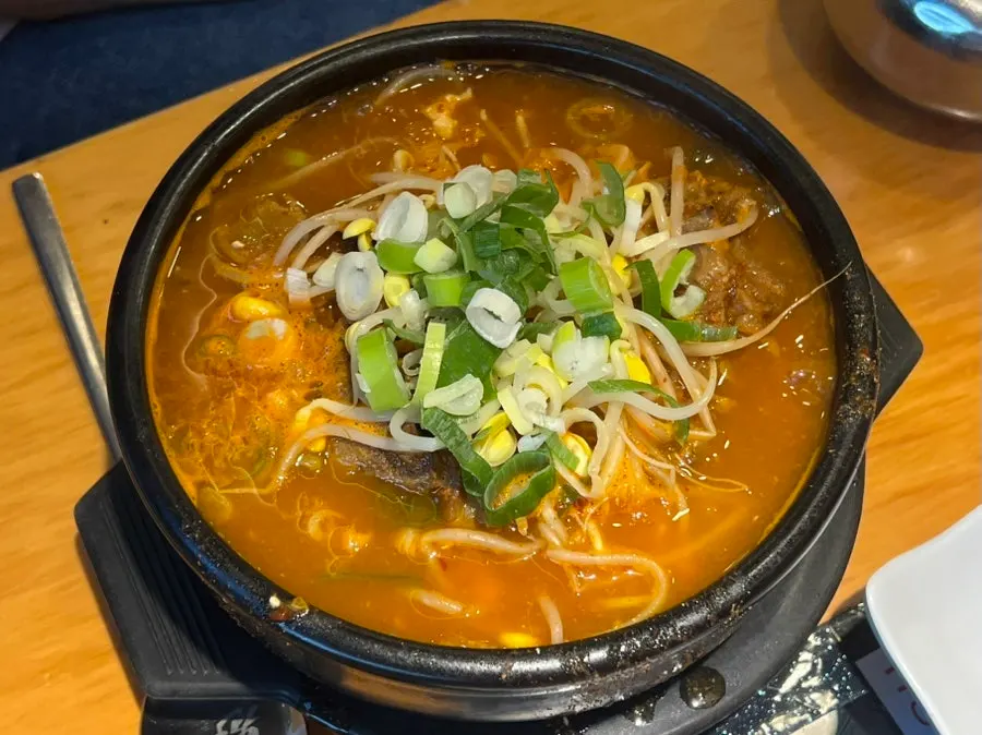 A bowl of tofu kimchi haejangguk