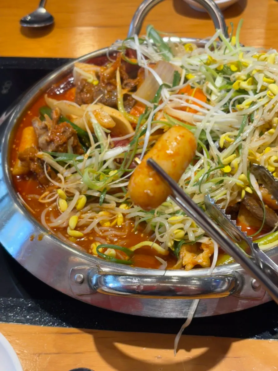 Cheese rice cake coated in spicy sauce