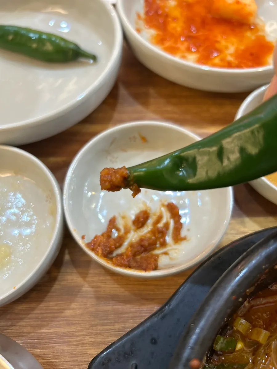 Seokbakji served alongside the soup