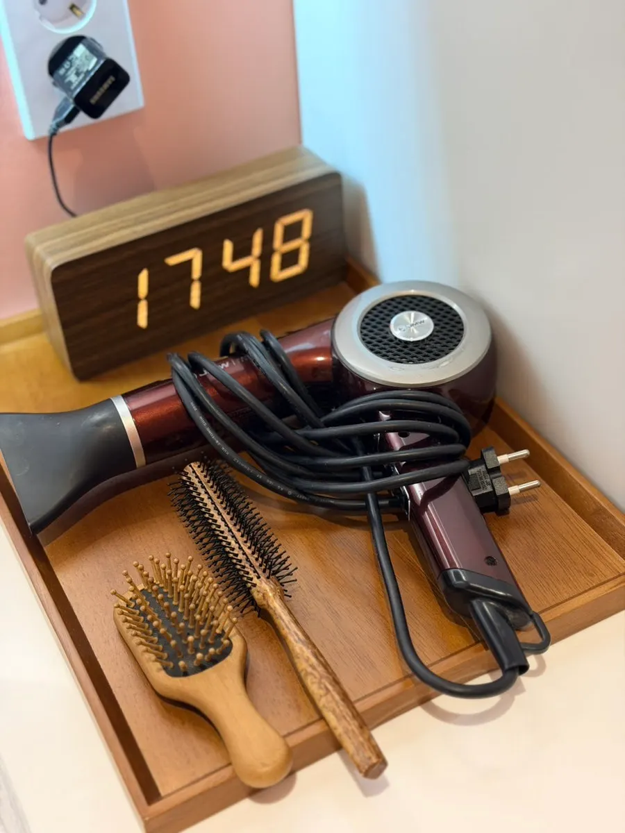 Hair dryer and dry shampoo in the powder room