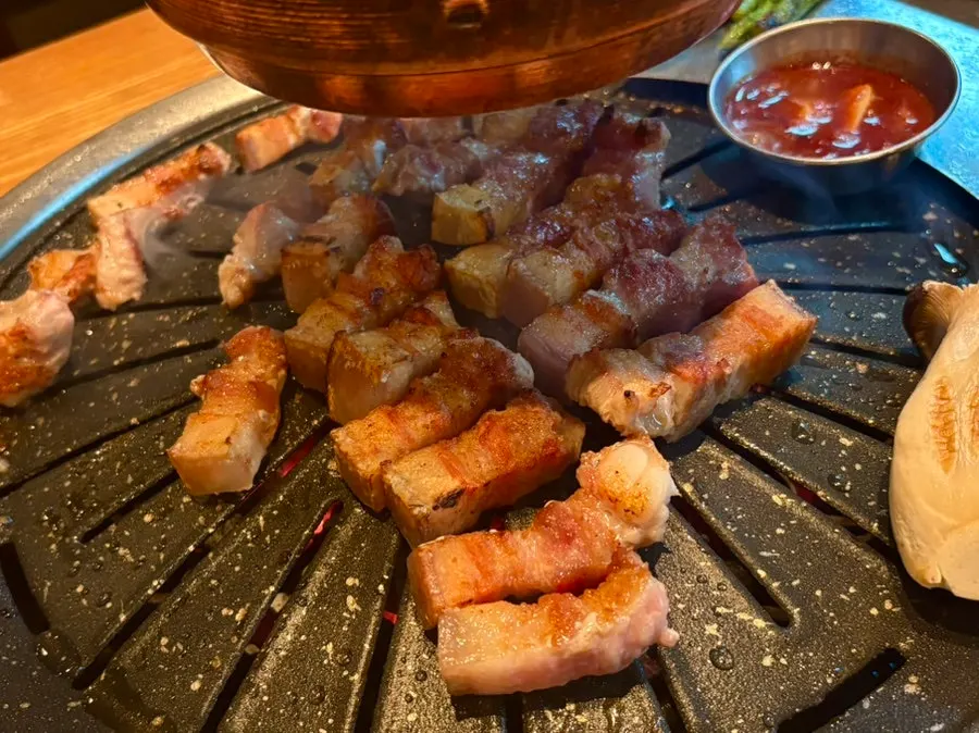 Black pork grilled golden outside and juicy inside