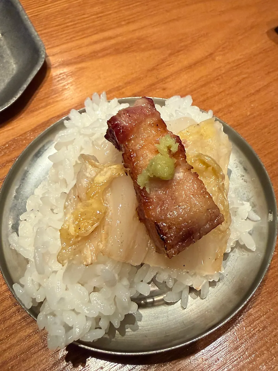 A juicy piece of black pork samgyeopsal