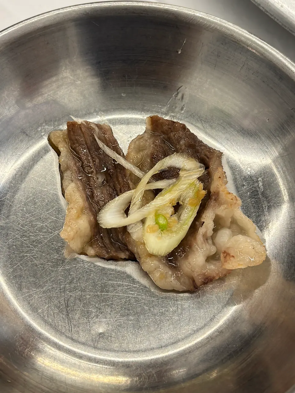 牛胸肉搭配葱丝