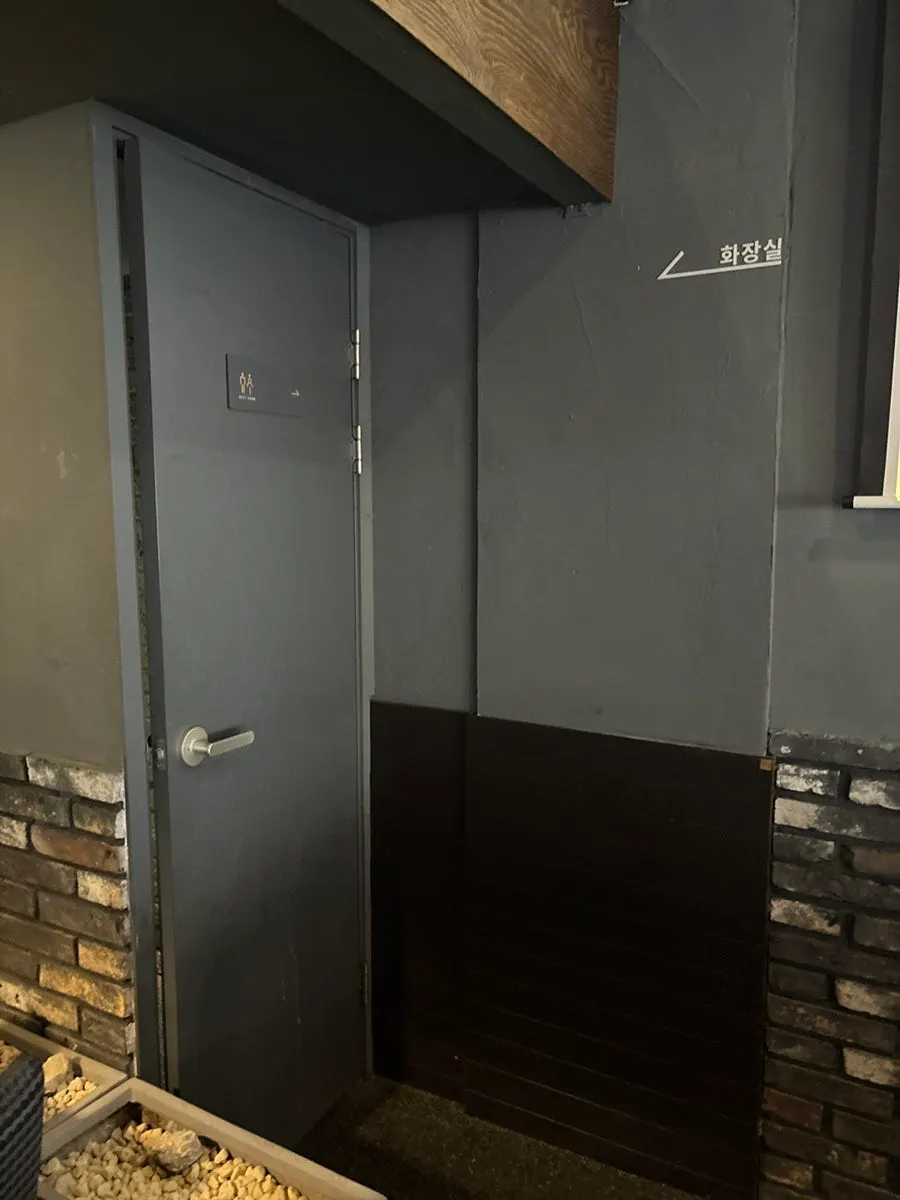 Open restaurant space connected to outdoor pocha-style seating