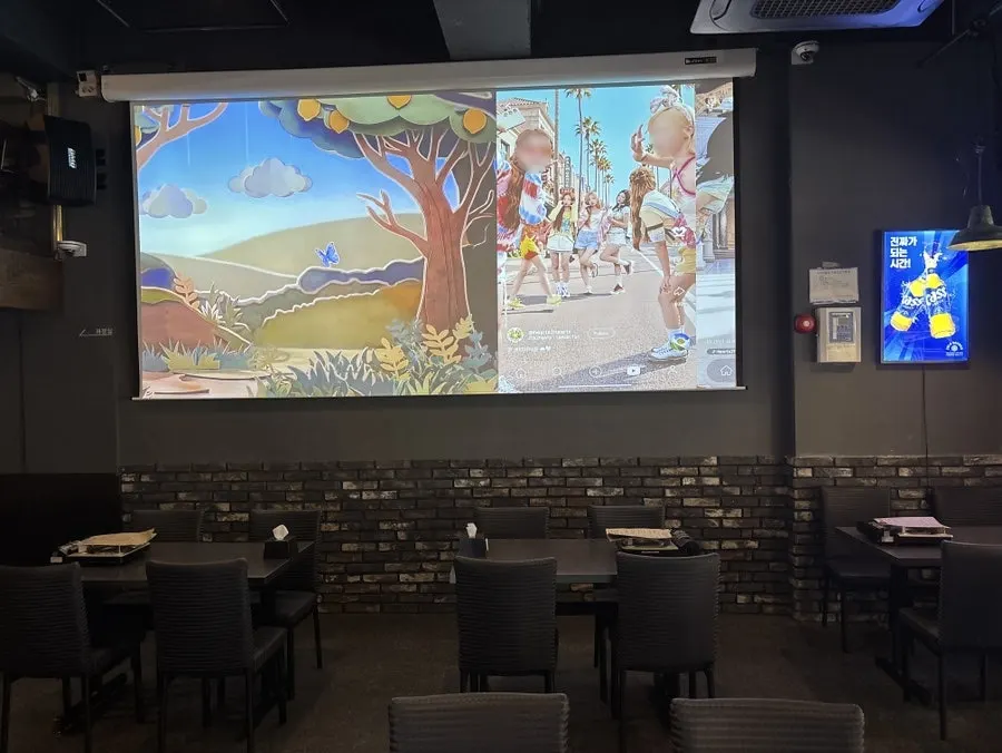 Spacious interior seating with a large screen