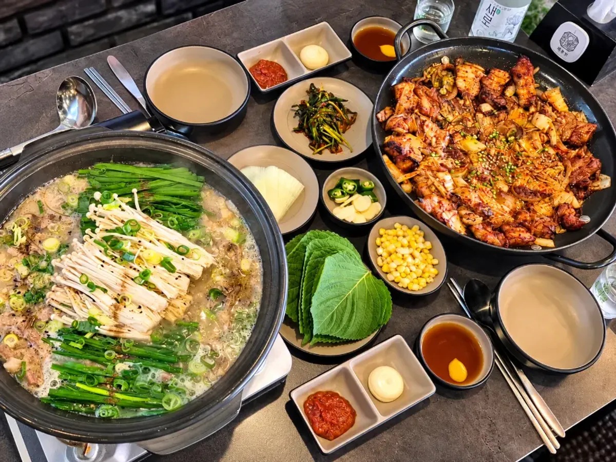 A full spread of pork belly kimchi grill and tendon hot pot
