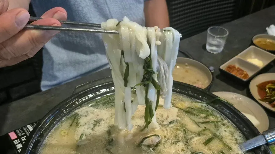 Thick kalguksu noodles cooked in bone broth