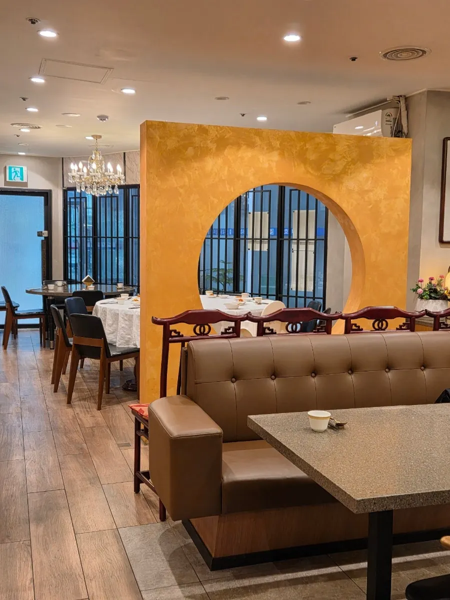 View of Seongung's dining hall with generous table spacing