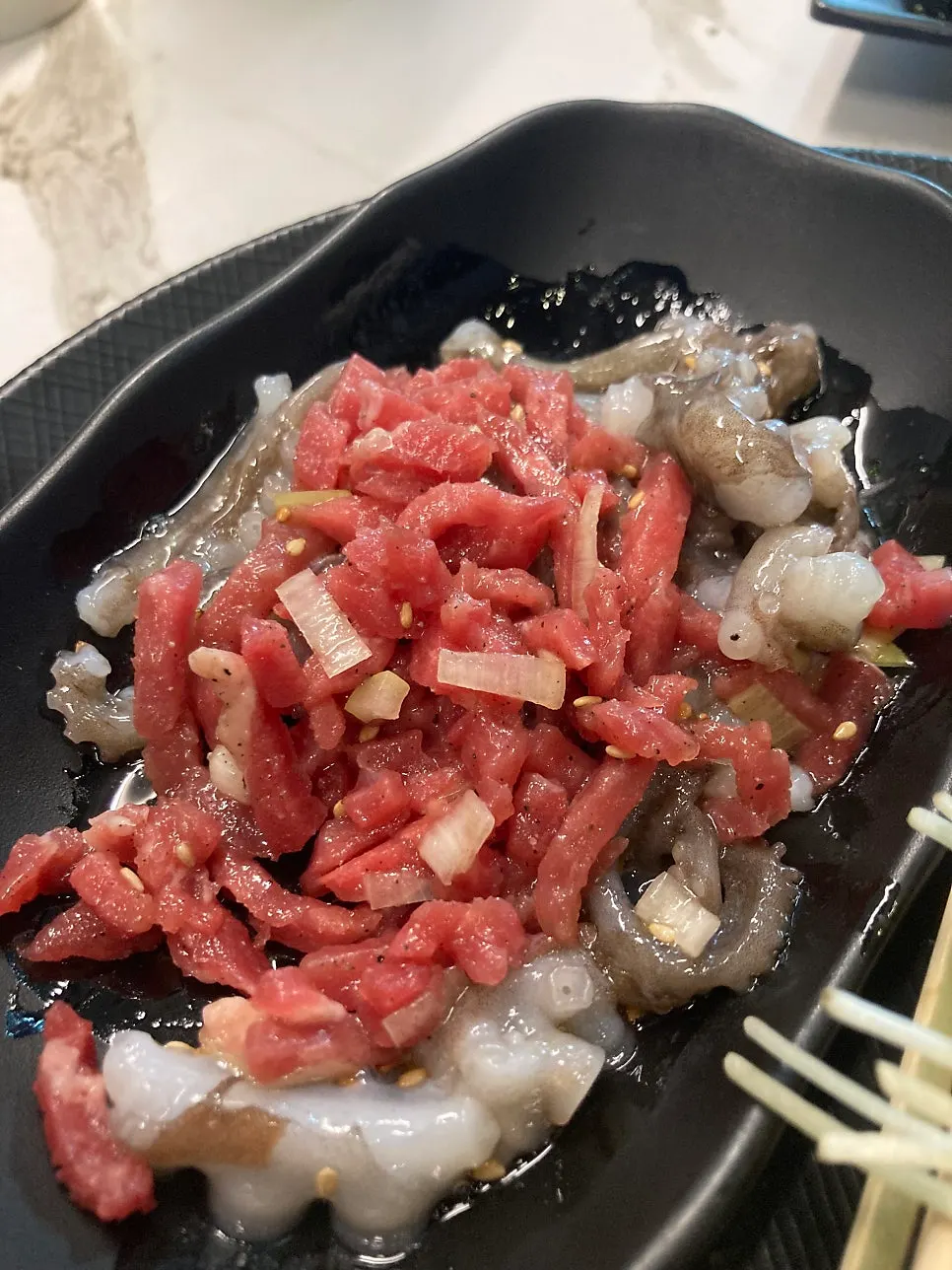 Live octopus and beef tartare tangtangi