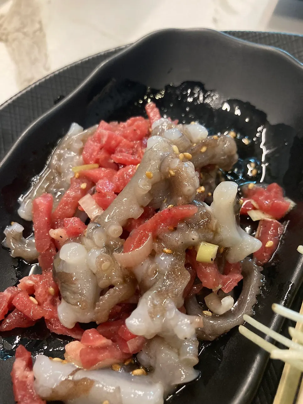 Mixed live octopus and beef tartare tangtangi