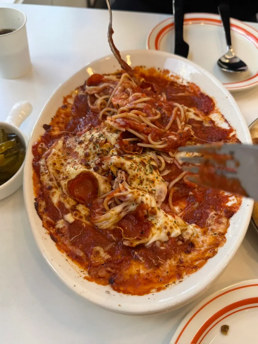 Stretchy melted cheese on the classic oven pasta