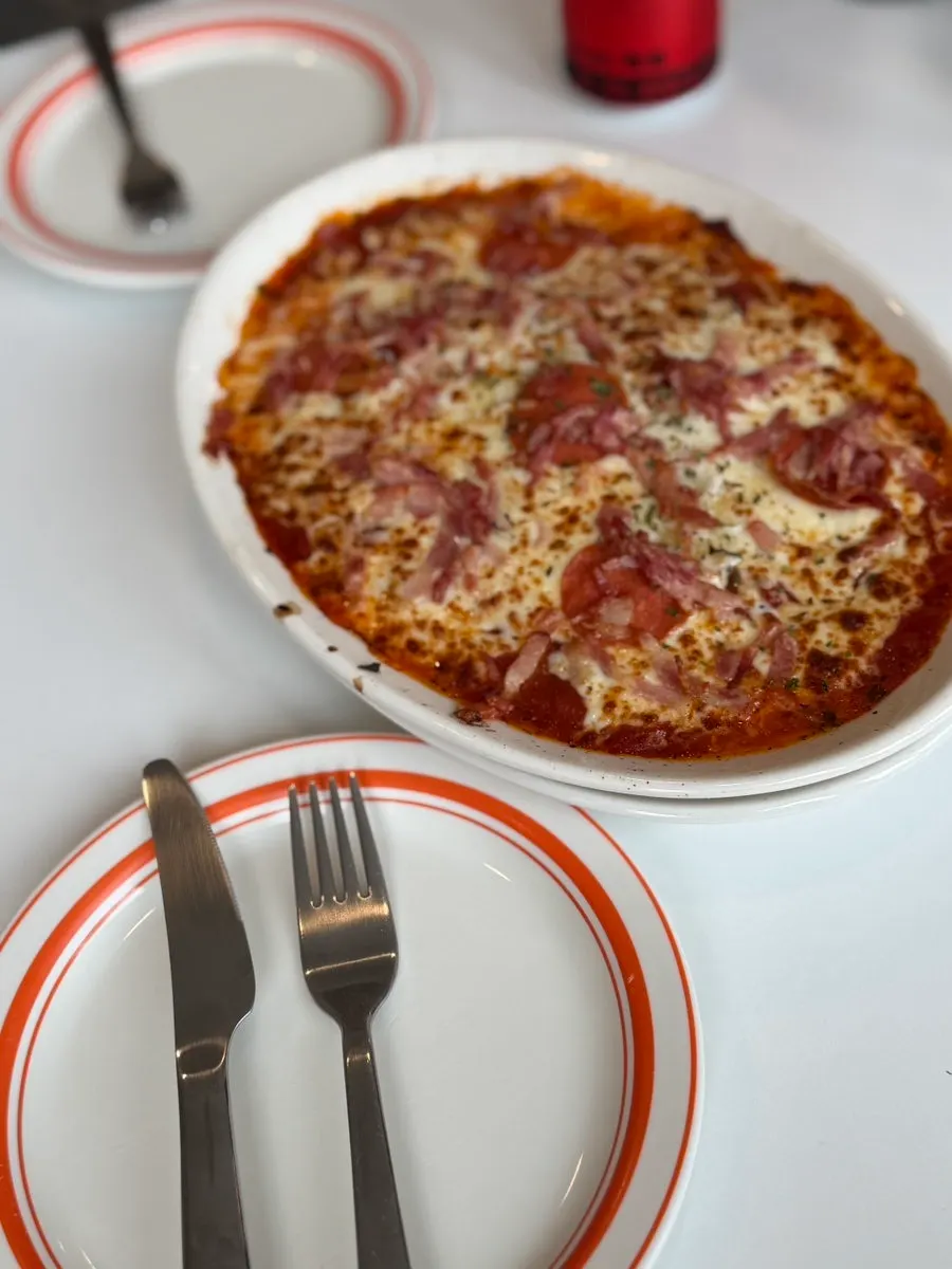 Freshly served cheese oven pasta in a large bowl