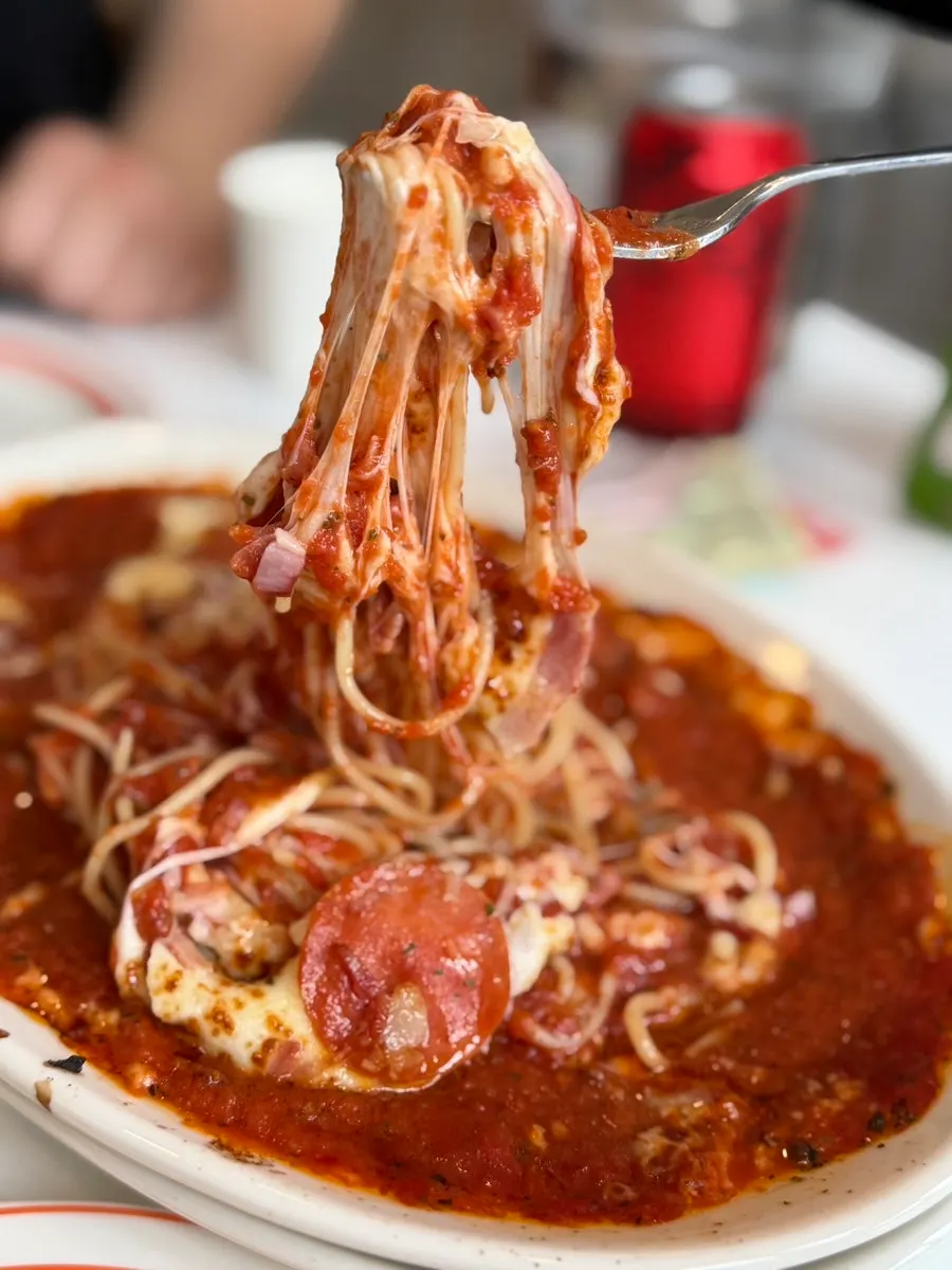 Cheese oven pasta cheese stretching long