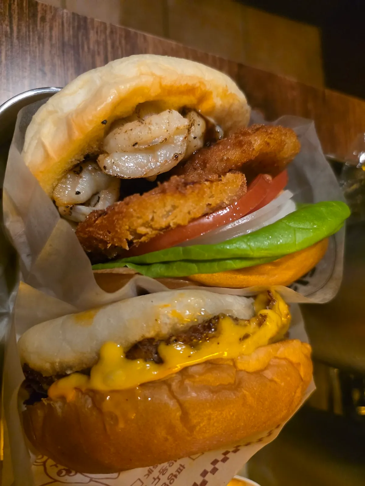 Sriracha Cheese Burger with cheese dripping out