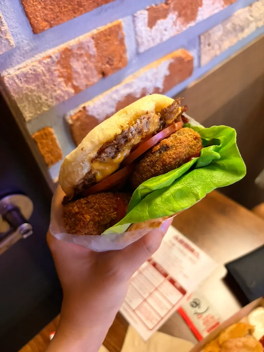 Wasabi mayo shrimp burger with onion rings