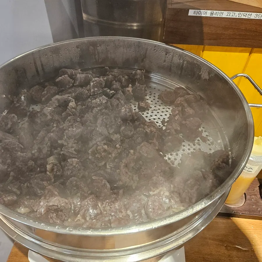 Free steamed blood sausage served at the table