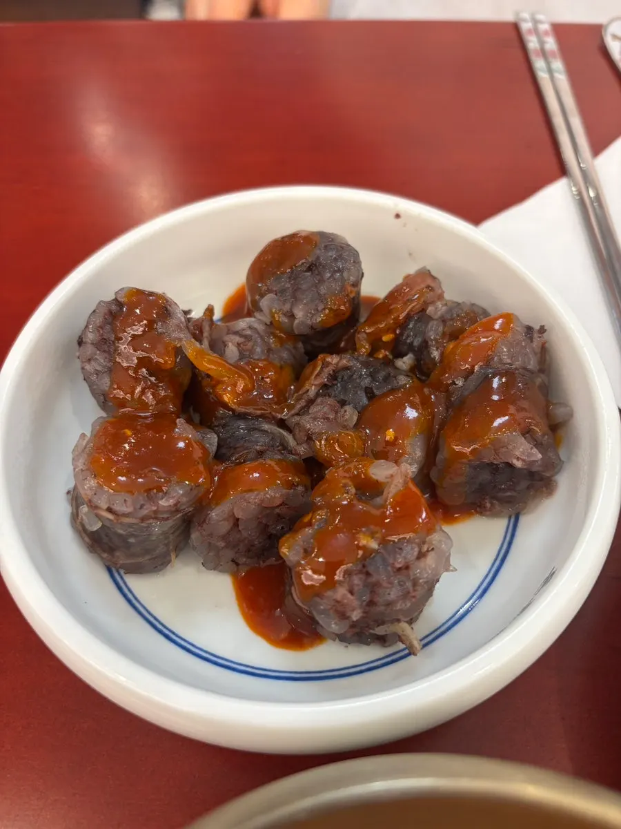 A plate of steamed blood sausage brought back from the counter