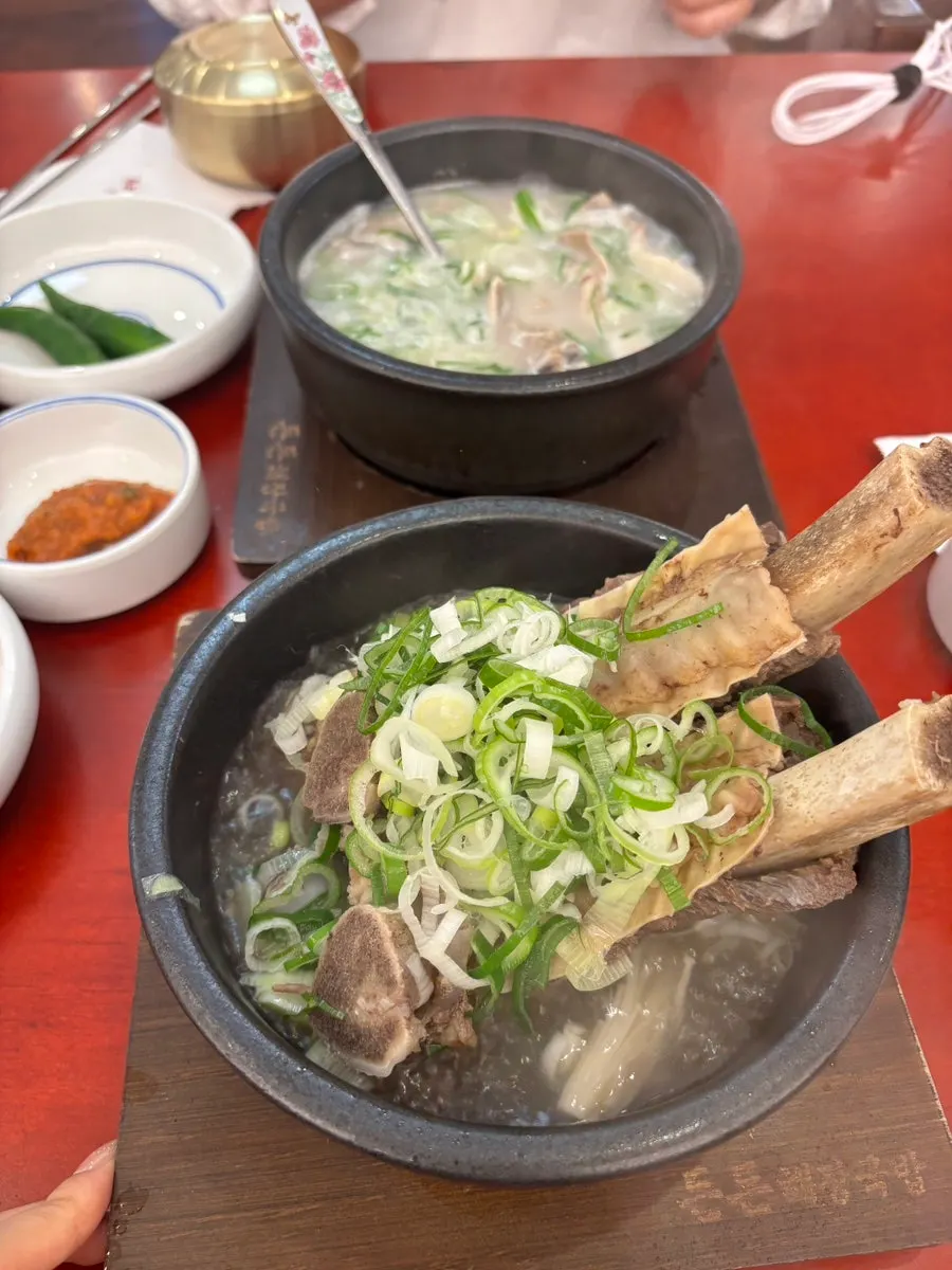 Gukbap and side dishes laid out at the end of the meal