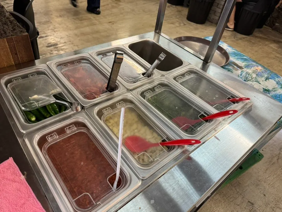 Side dishes and bowls at the self-serve bar