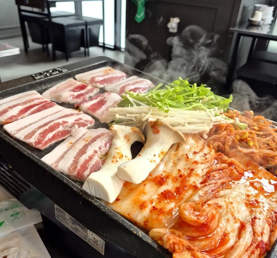 Grill piled high with vegetables