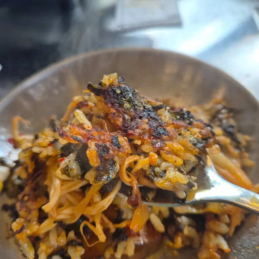 Fried rice pressed down and crisped on the grill