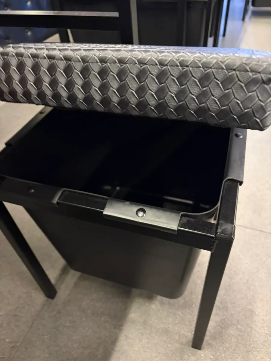 Storage compartment inside the chair for bags