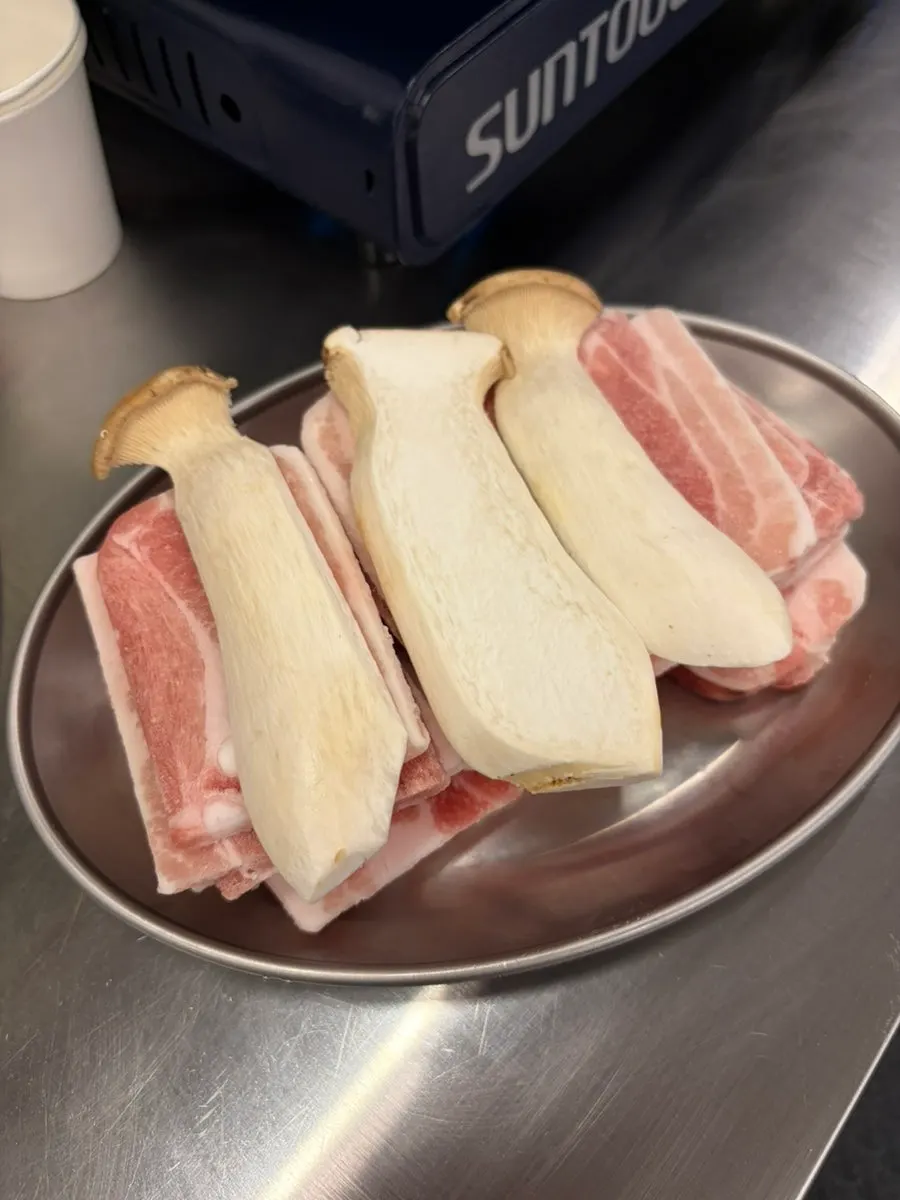 Three servings of stacked frozen pork belly