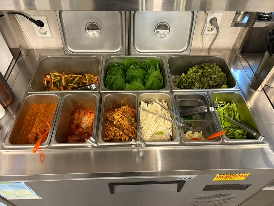 Minari and enoki mushroom section at the self-bar