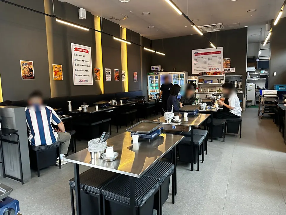 High-ceilinged interior tables at Super Naengsam Sangbong Main Branch