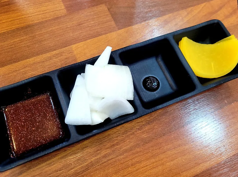 Onion, chunjang, and pickled radish basic side dishes