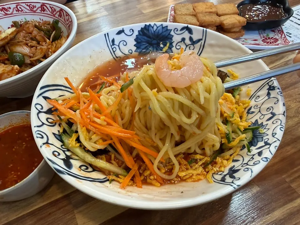 A bowl of cool seafood cold jjamppong broth