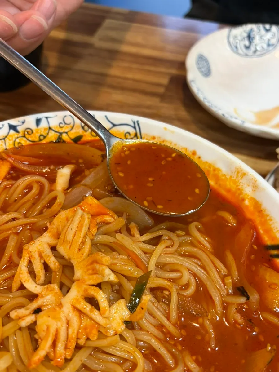 Jjamppong broth with a bowl of rice