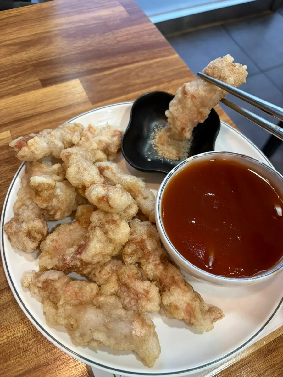 Cross-section of sweet and sour pork packed with meat