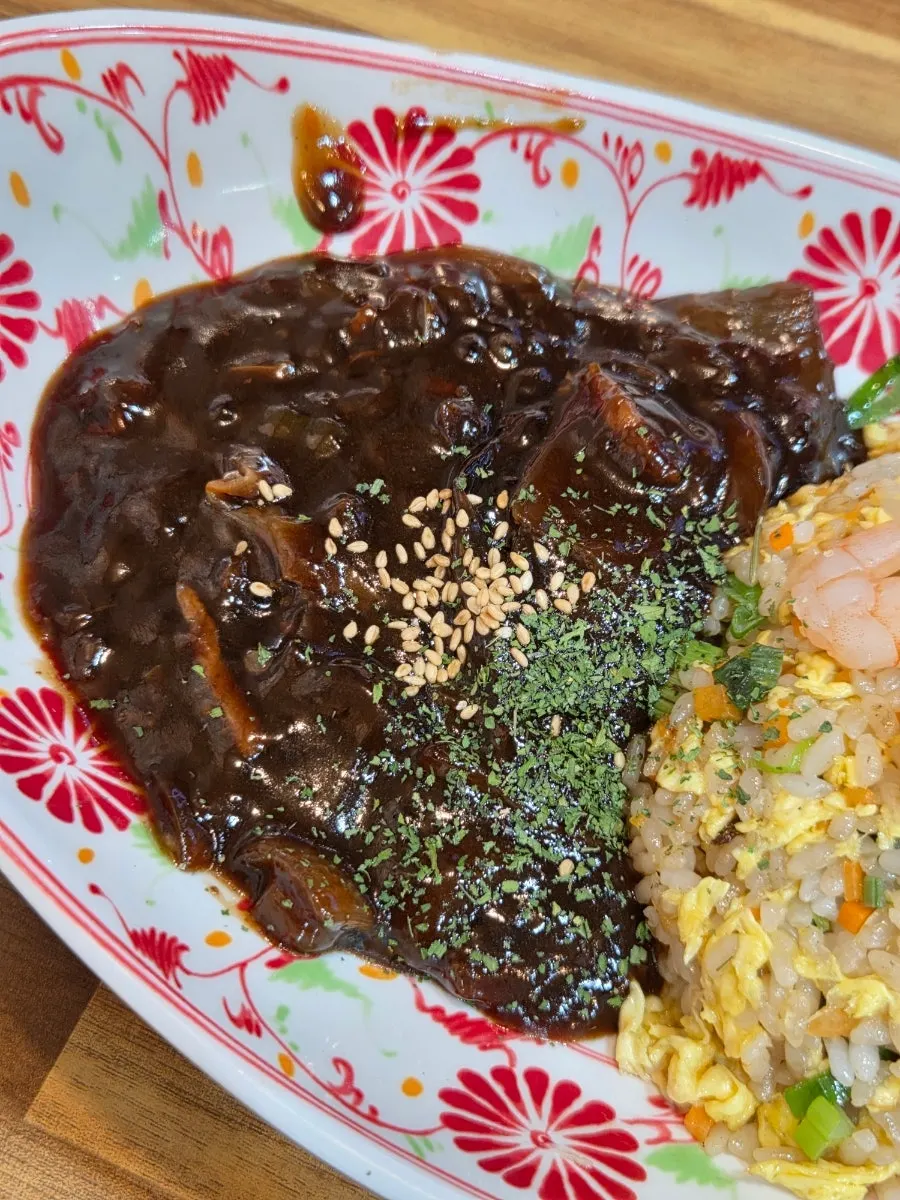 Close-up of chili-loaded fiery meat jjajang