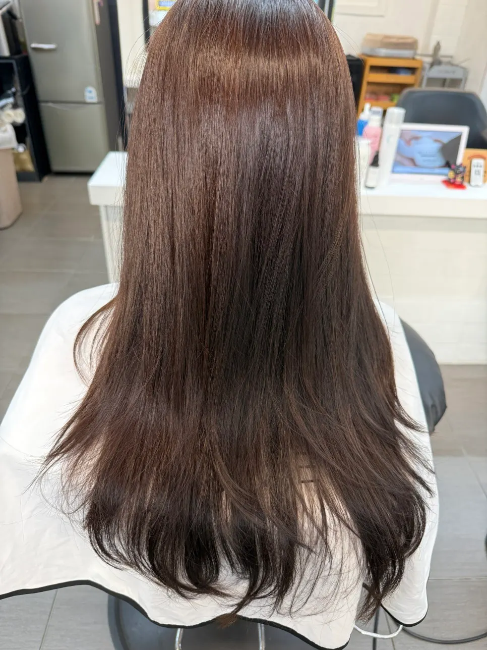 Soft brown tone-down hair result