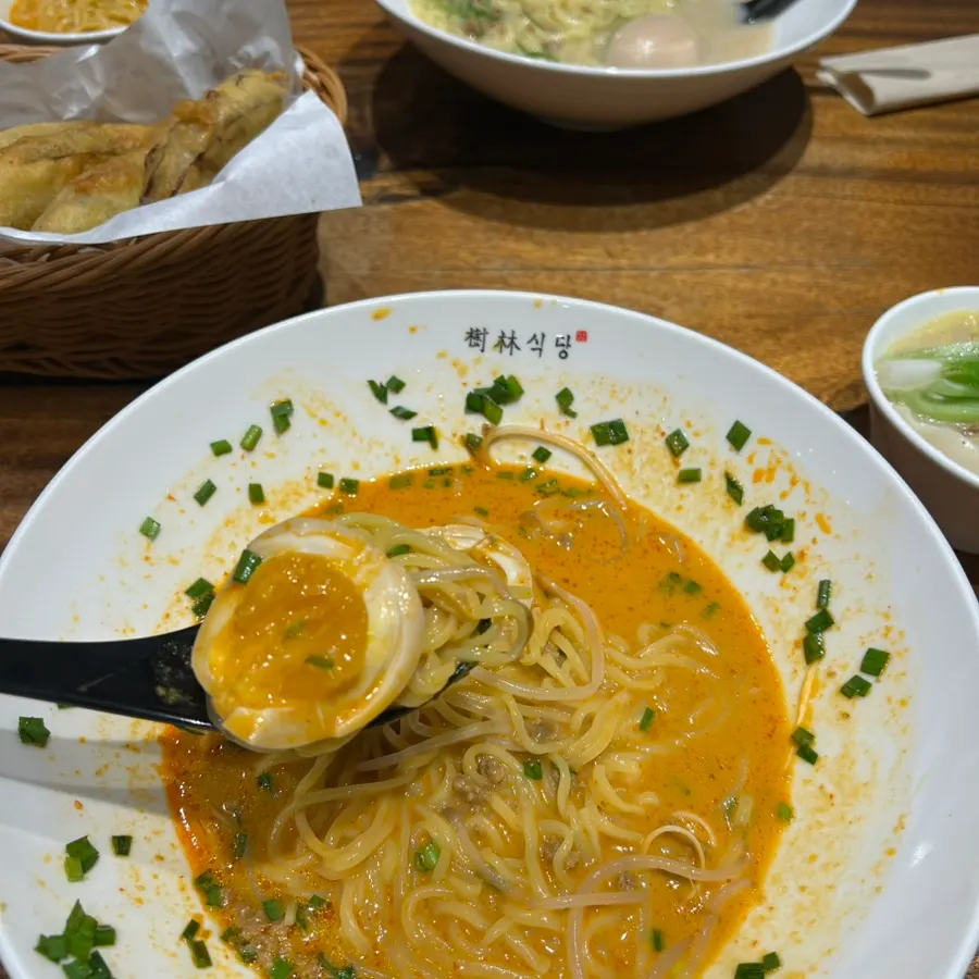 Dandan noodles topped with house-made flavor oil