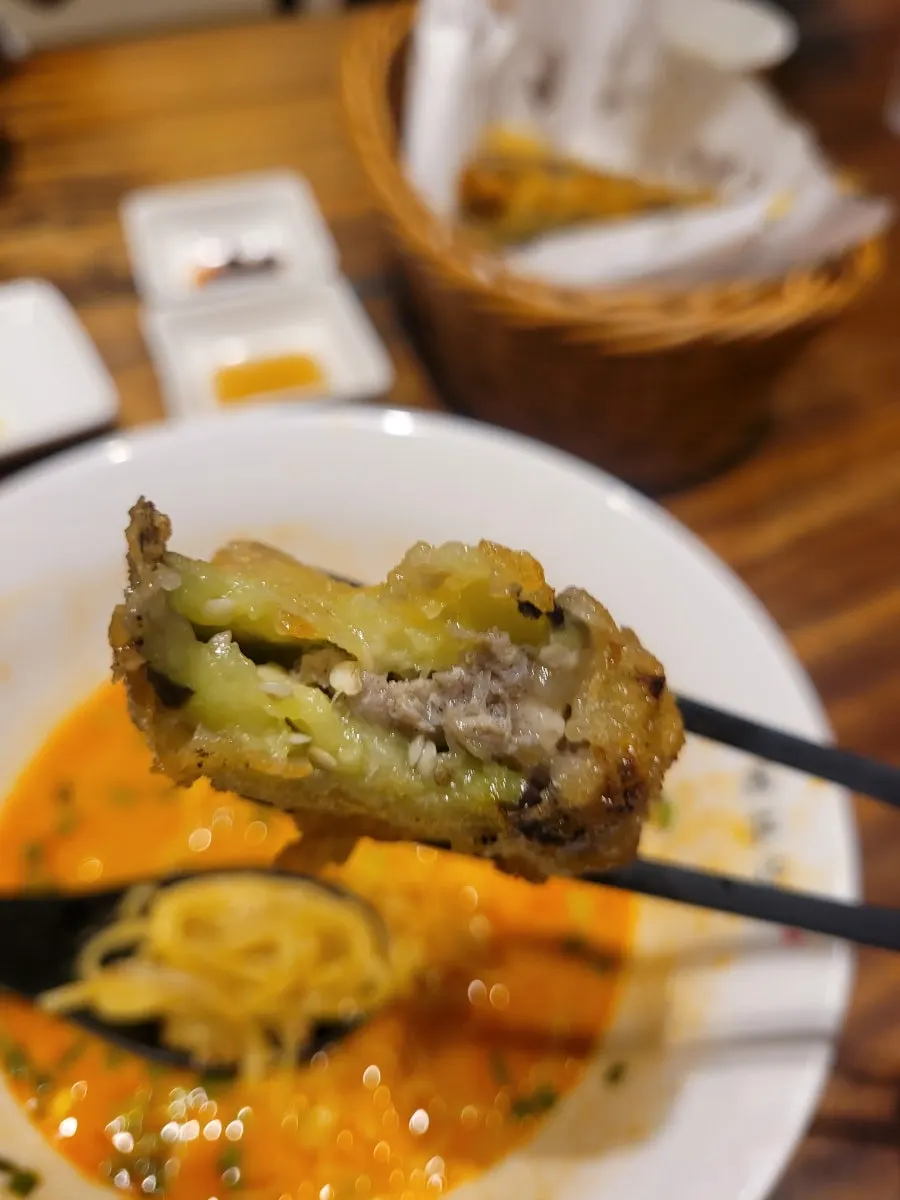 Cross-section of stuffed eggplant mandu