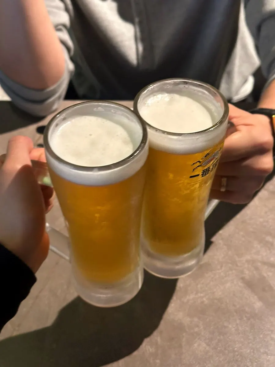 Table with gwangban-yuksa and a draft beer together