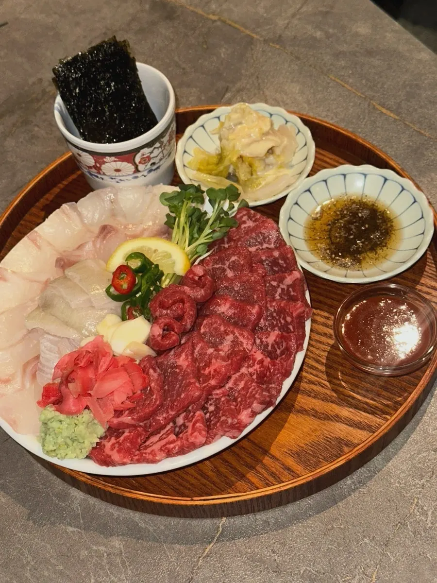 Remaining aged sashimi and a beer glass