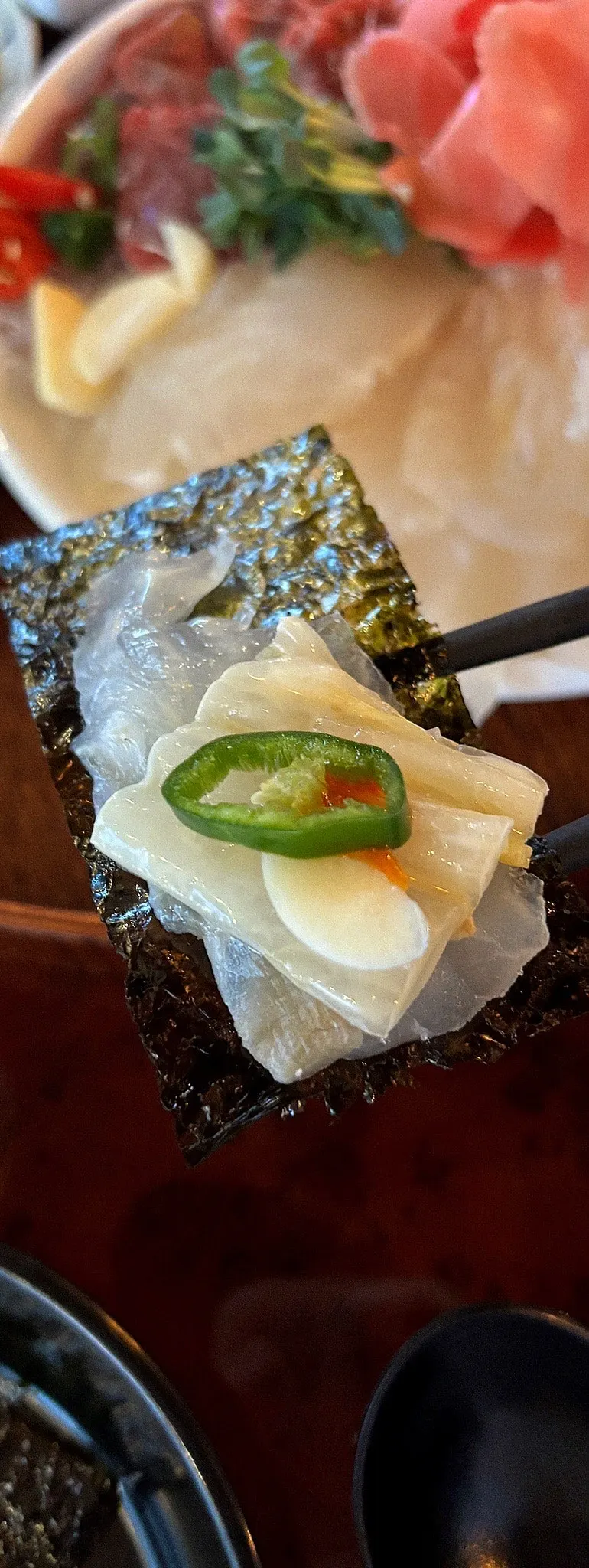 Sashimi served with sauce-tossed baek-kimchi