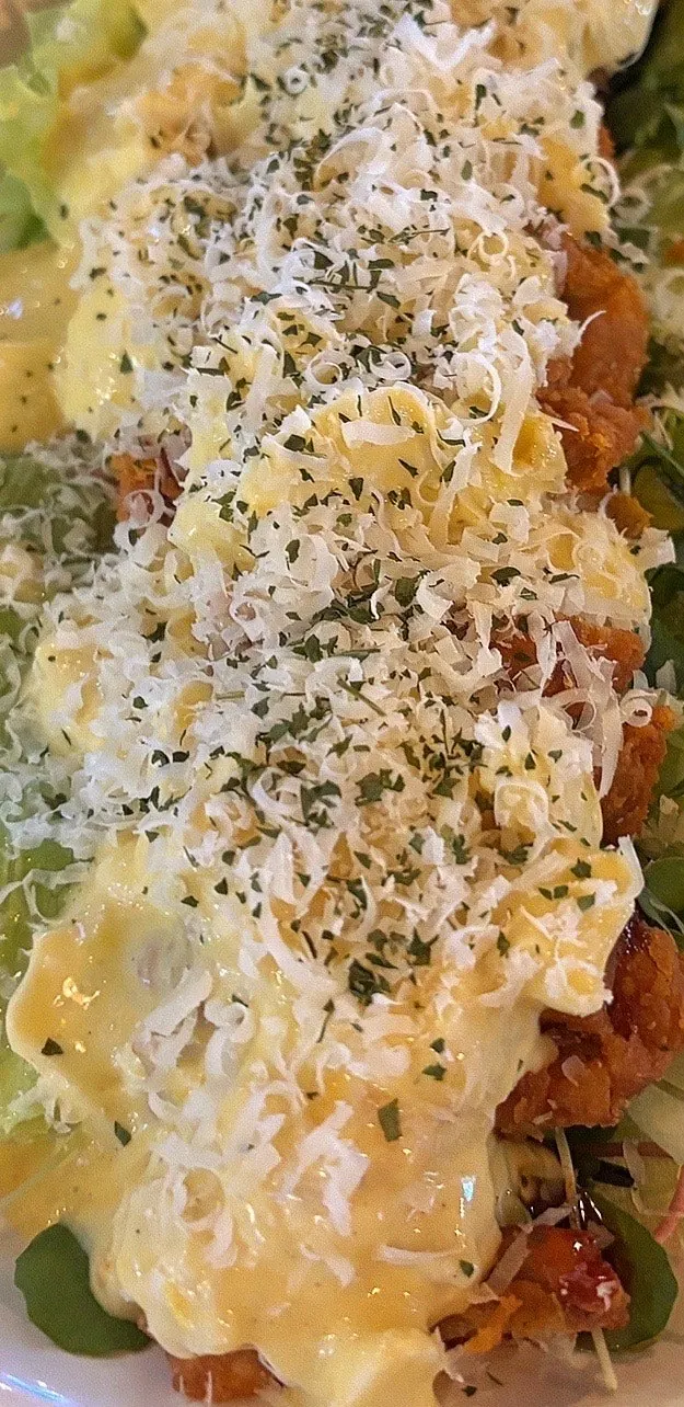 Chicken nanban with tartare sauce over a bed of salad