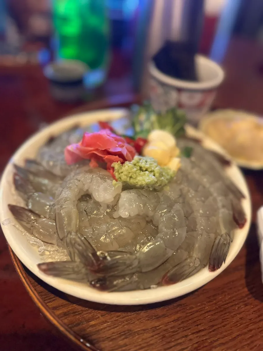 Close-up of the generous raw shrimp sashimi portion