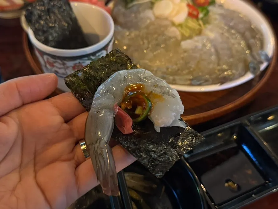 Raw shrimp sashimi wrapped in raw laver